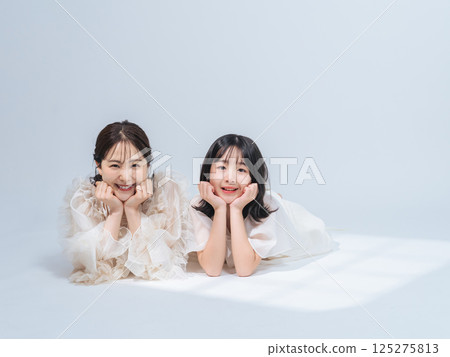 Mother and daughter portrait Mother and daughter portrait 125275813