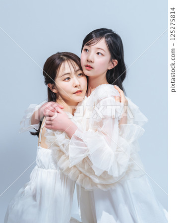 Mother and daughter portrait Mother and daughter portrait 125275814