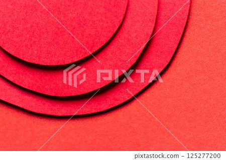 Overlapping circular colored paper background 125277200