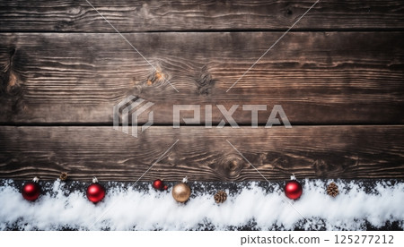 Christmas decorations and gifts and garland on an old wooden background for new year celebrations, winter fairy tale 125277212