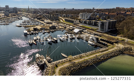 Aarhus wooden sailboat marina with the center of Aarhus in the background 125277331