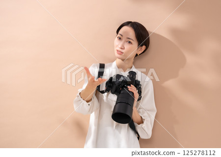 女士米色相機包 125278112