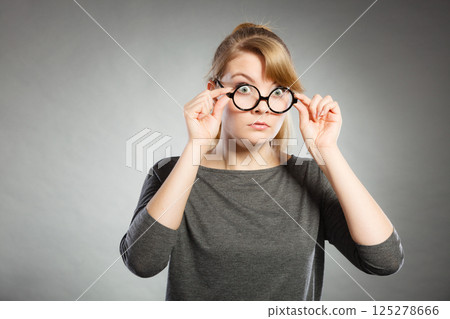 Surprised astonished girl with open mouth. 125278666
