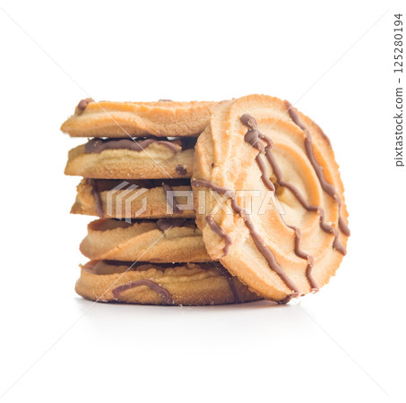Sweet chocolate cookies isolated on white background. 125280194