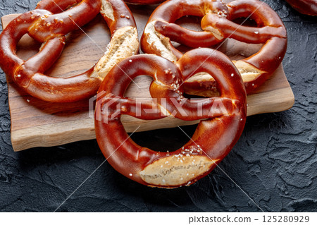 Pretzel or Bretzel, traditional German beer snack, a wheat bread with salt 125280929