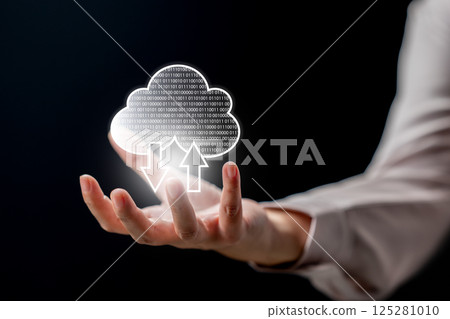 Businessperson showing a cloud computing icon on his hand. Technology innovation on a virtual screen. Concept of Cloud computing technology, data storage, networking, and internet service Businessperson showing a cloud computing icon on his hand. Technology innovation on a virtual screen. Concept of Cloud computing technology, data storage, networking, and internet service 125281010