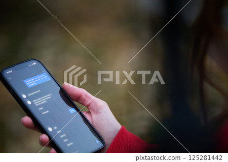 Tired fitness woman after workout and use smartphone with green screen Tired fitness woman after workout and use smartphone with green screen 125281442