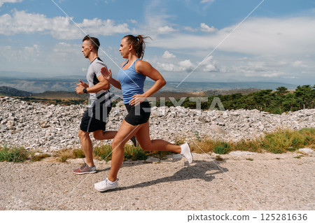 Mountain Bliss: Capturing the Joy of Morning Trail Running Mountain Bliss: Capturing the Joy of Morning Trail Running 125281636