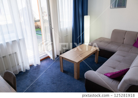 A peaceful rehabilitation center room where patients rest and recover after therapy sessions, promoting healing and well being. A peaceful rehabilitation center room where patients rest and recover after therapy sessions, promoting healing and well being. 125281918