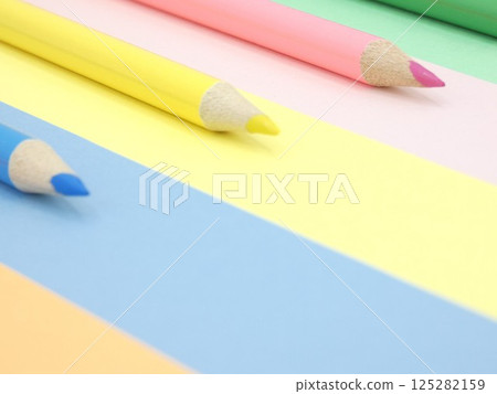 Colored pencils and colored paper Colored pencils and colored paper 125282159
