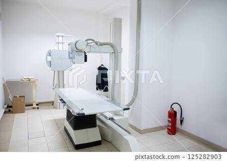 A modern rehabilitation device designed to enhance muscle function and recovery, utilizing advanced technology to support patient rehabilitation and physical therapy. 125282903