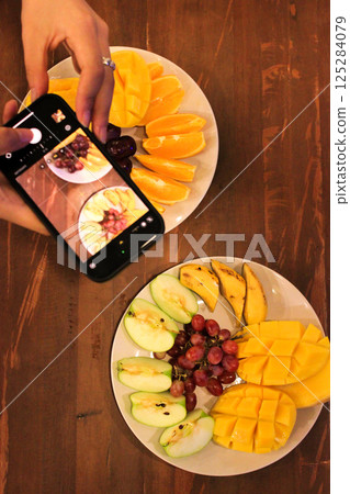 Fruits arranged on the table 125284079