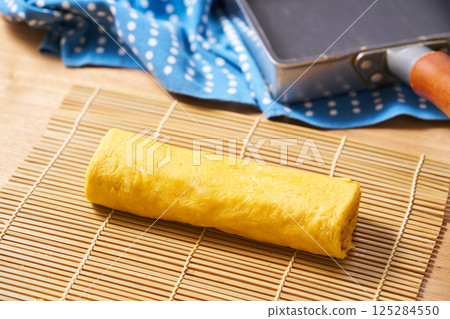 Freshly baked egg roll Freshly baked egg roll 125284550