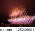 Fireworks blooming in the night sky 125286624
