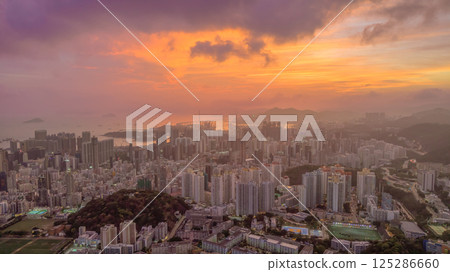 April 17 2025 Cityscape During Sunset with Vibrant Skies and Urban 125286660