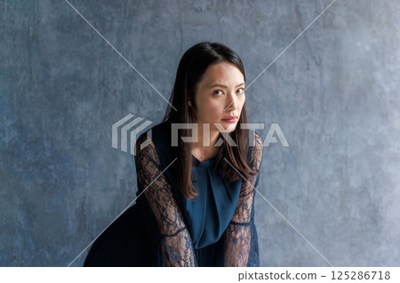 Women's portrait in forties Women's portrait in forties 125286718