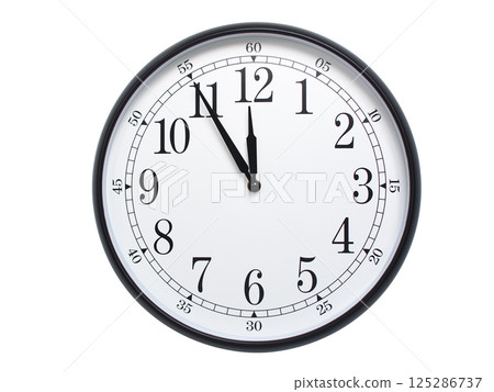 Round wall clock with black frame showing time at 11:55 or 23:55. Ideal for concepts of time or scheduling. Round wall clock with black frame showing time at 11:55 or 23:55. Ideal for concepts of time or scheduling. 125286737