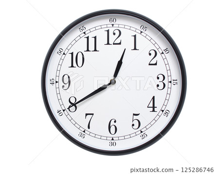 Round wall clock with black frame showing time at 00:40 or 12:40. Ideal for concepts of time or scheduling. Round wall clock with black frame showing time at 00:40 or 12:40. Ideal for concepts of time or scheduling. 125286746