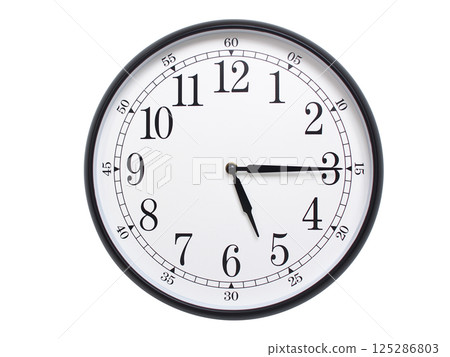 Round wall clock with black frame showing time at 05:15 or 17:15. Ideal for concepts of time or scheduling. 125286803