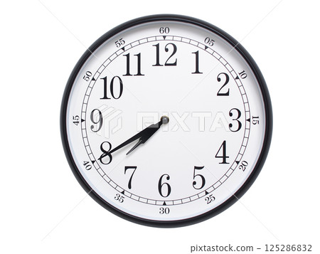 Round wall clock with black frame showing time at 07:40 or 19:40. Ideal for concepts of time or scheduling. 125286832