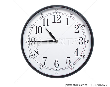 Round wall clock with black frame showing time at 10:45 or 22:45. Ideal for concepts of time or scheduling. 125286877