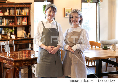 Two female baristas Two female baristas 125288126