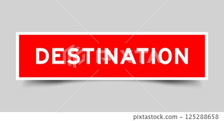 Red color square shape sticker label with word destination on gray background Red color square shape sticker label with word destination on gray background 125288658