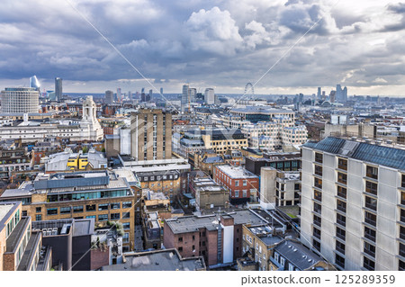 Panoramic Aerial View of London Cityscape Featuring Iconic Buildings and Urban Skyline 125289359