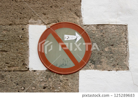Old traffic sign No parking on a wall, Spain Old traffic sign No parking on a wall, Spain 125289683