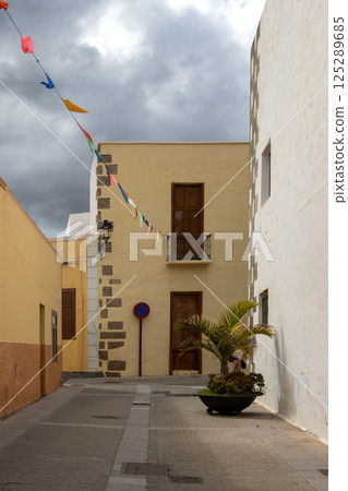 Street with a palm tree, Aguimes, Gran Canaria Street with a palm tree, Aguimes, Gran Canaria 125289685