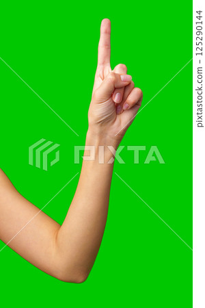 Hand gesture indicating number one with a green background during a creative or educational activity 125290144