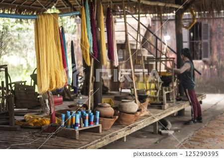 natural silk drying at traditional rural textile workshop in cambodia natural silk drying at traditional rural textile workshop in cambodia 125290395