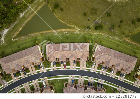 View from above of densely built residential houses in closed living clubs in south Florida. American dream homes as example of real estate development in US suburbs 125291772