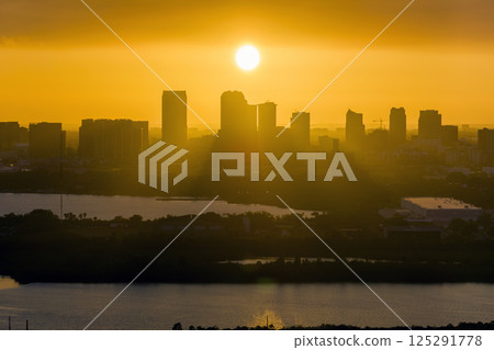 Urban sunset landscape of downtown district of Tampa city in Florida, USA. Dramatic skyline with high skyscraper buildings in modern american megapolis 125291778