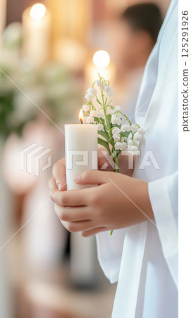 Chrismation symbol with young girls hands holding candle and flowers Chrismation symbol with young girls hands holding candle and flowers 125291926