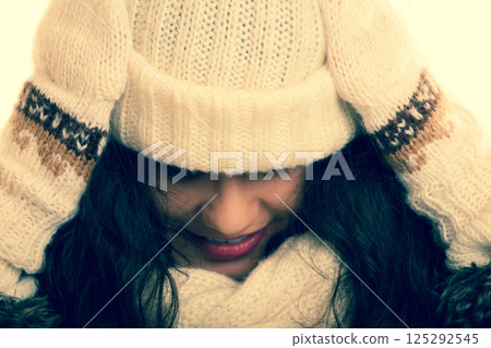 Winter fashion young woman in warm clothing Winter fashion young woman in warm clothing 125292545