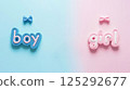 Pink and blue background with the words boy and girl with bow and bow tie. Gender reveal party. Waiting for the baby. 125292677
