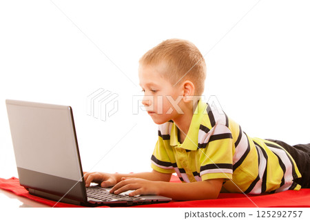 Education, technology internet - little boy with laptop Education, technology internet - little boy with laptop 125292757