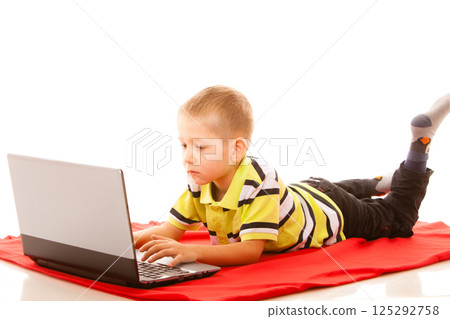 Education, technology internet - little boy with laptop Education, technology internet - little boy with laptop 125292758