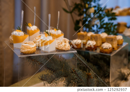 Elegant Display of Gourmet Desserts at a Lavish Event Elegant Display of Gourmet Desserts at a Lavish Event 125292937