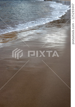 Sand beach and a line of the tide, Gran Canaria, Spain Sand beach and a line of the tide, Gran Canaria, Spain 125293447