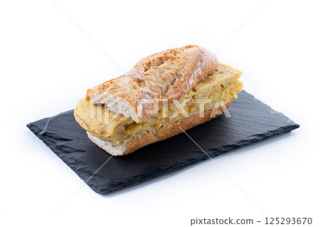 Spanish potato omelette sandwich isolated on white background Spanish potato omelette sandwich isolated on white background 125293670
