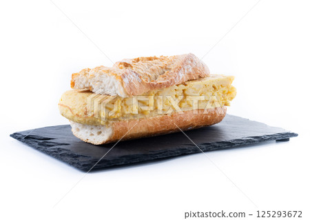 Spanish potato omelette sandwich isolated on white background Spanish potato omelette sandwich isolated on white background 125293672