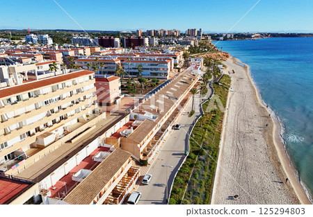Aerial shot of spanish resort town of Mil Palmeras. Costa Blanca. Spain Aerial shot of spanish resort town of Mil Palmeras. Costa Blanca. Spain 125294803