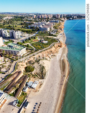 Aerial shot of spanish resort town of Mil Palmeras. Costa Blanca. Spain Aerial shot of spanish resort town of Mil Palmeras. Costa Blanca. Spain 125294806