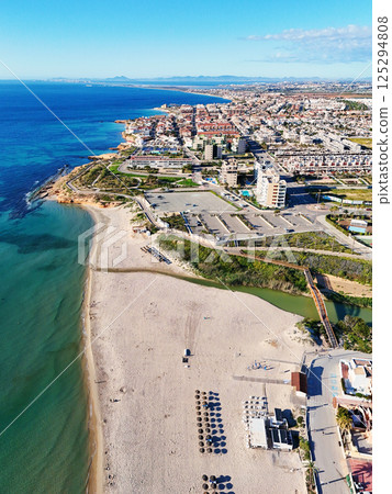 Aerial shot of spanish resort town of Mil Palmeras. Costa Blanca. Spain Aerial shot of spanish resort town of Mil Palmeras. Costa Blanca. Spain 125294808