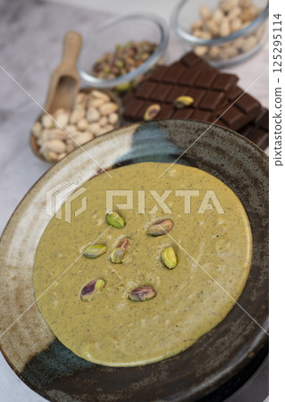 Creamy pistachio spread perfect for chocolate desserts in Dubai Creamy pistachio spread perfect for chocolate desserts in Dubai 125295114