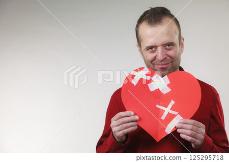 Smiling man with healed heart. 125295718