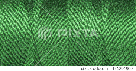Green sewing thread texture 125295909
