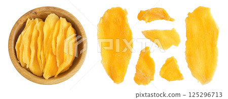 dried mango in wooden bowl isolated on white background. Top view. Flat lay 125296713